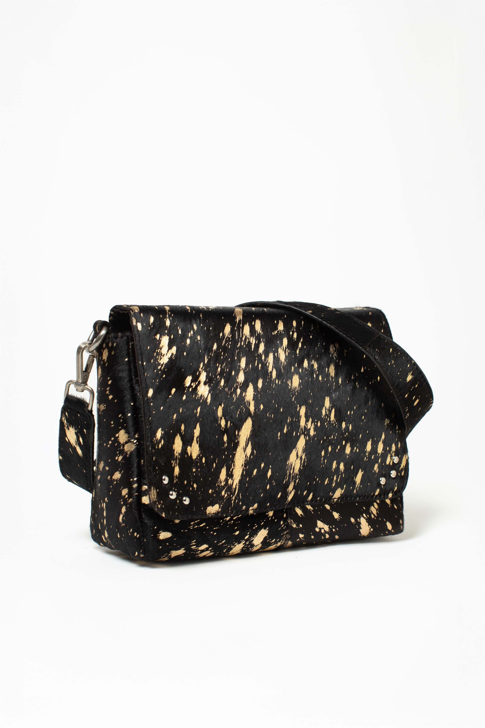 Sac bandoulière Alba Fauve de Charlay Stone en cuir pony animalier imprimé noir doré.