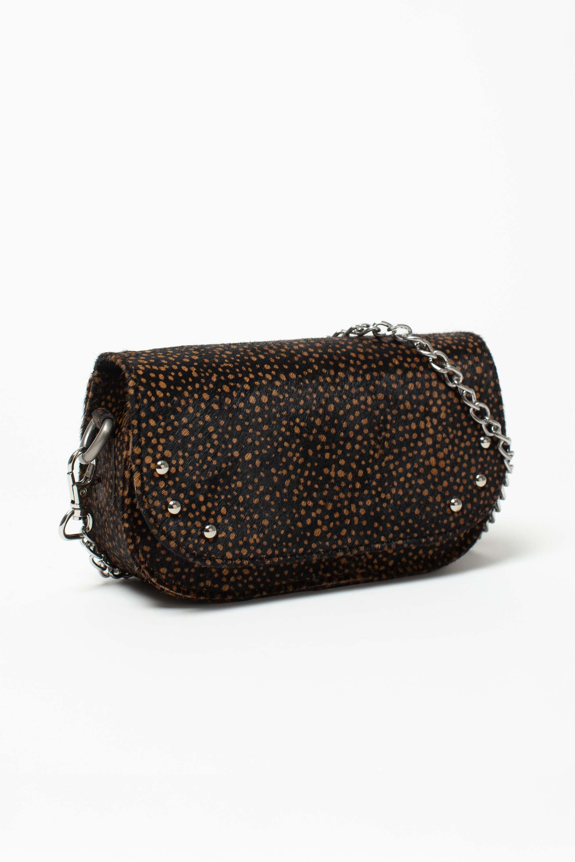 Sac bandoulière Alice Fauve de Charlay Stone en cuir pony animalier imprimé noir à pois marron.